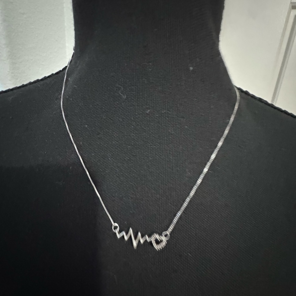 Elegant Silver Heartbeat Necklace